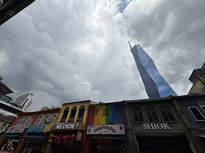 shophouse with towers behind